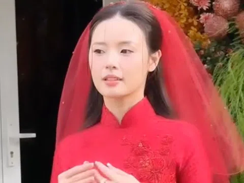 Áo dài cưới 'hoa mơ trong tuyết' của Midu